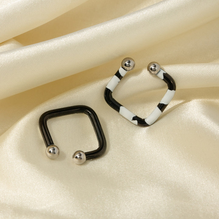 Women's Elegant Oil Drip Stainless Steel Earrings"?