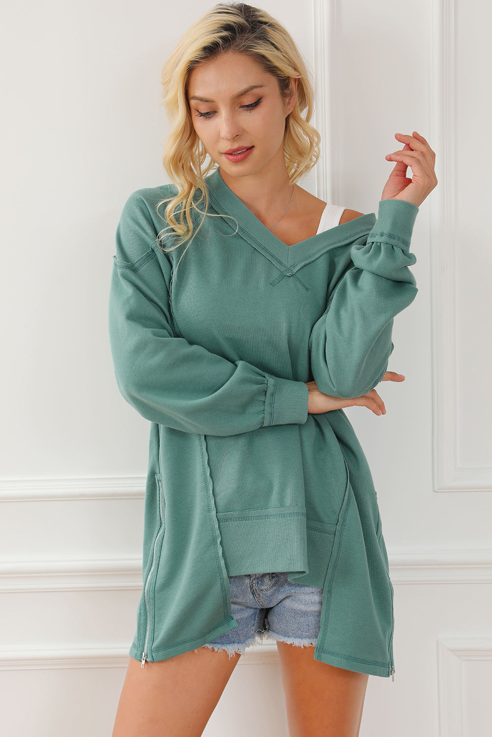 Women's V-Neck Exposed Seam Sweatshirt with Zip Detail